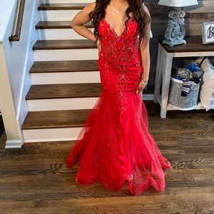 Red sparkly prom dress that was worn once and in great condition.